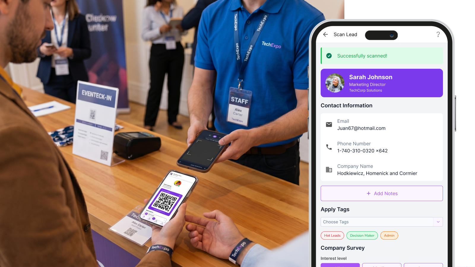 Booth staff scanning an attendee badge on a phone
